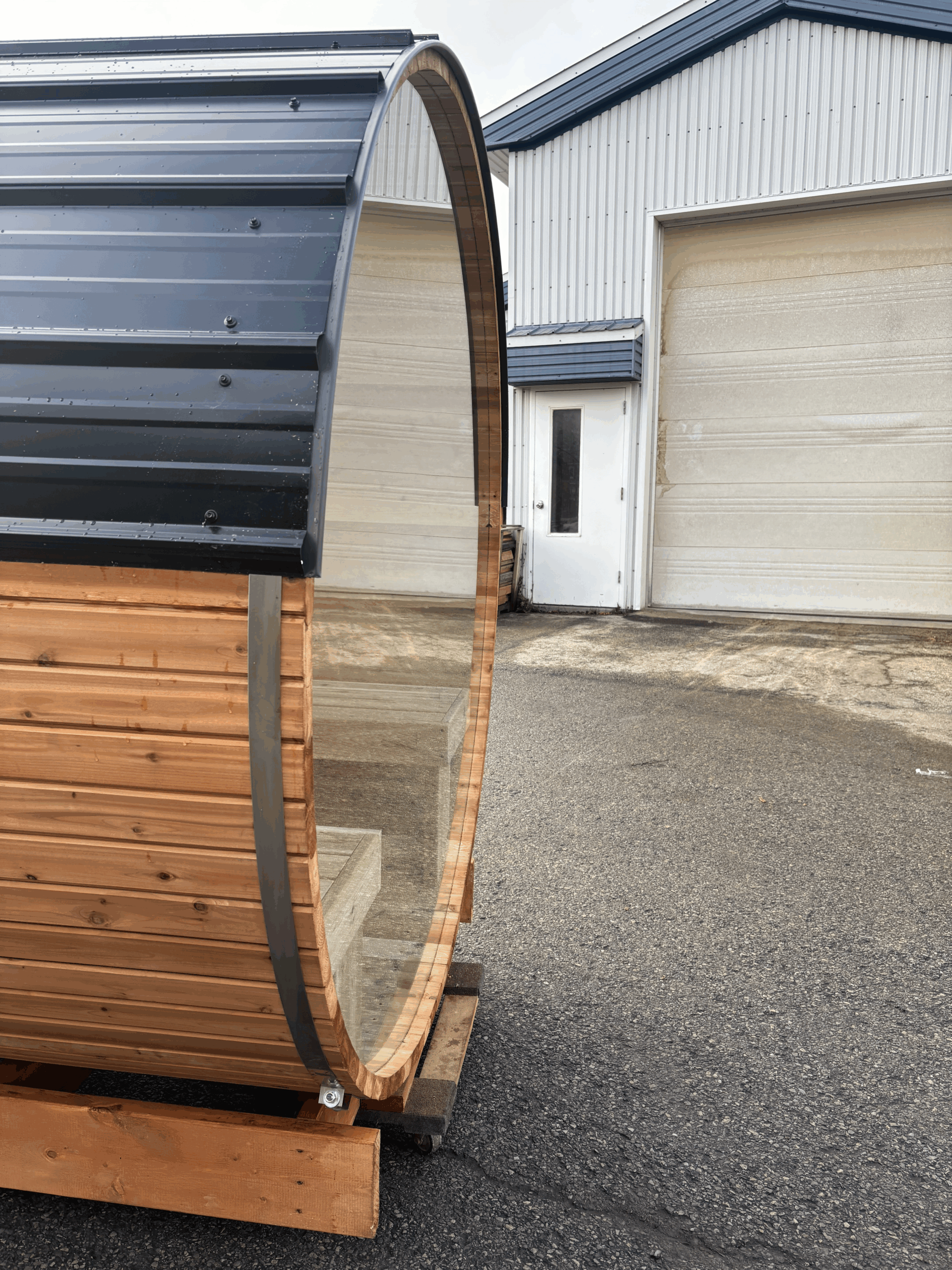 Canadian-made Saunaspa wooden sauna featuring a complete front panel constructed from 10 mm tempered glass.